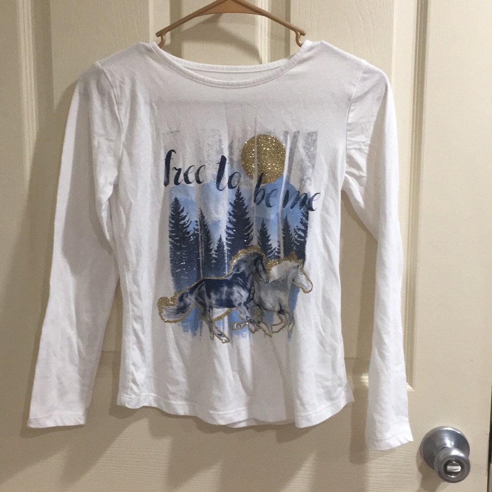 glittery white shirt with horses on it